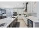 Bright kitchen features a large island, sleek appliances, and lots of storage at 10662 Woodchase Cir, Orlando, FL 32836