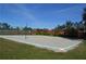 Sand volleyball court for residents, with a net and well-maintained surroundings at 10662 Woodchase Cir, Orlando, FL 32836