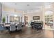 Elegant dining room with chandelier, large mirror, and hardwood floors at 1125 E Tuskawilla Pt, Winter Springs, FL 32708