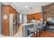 Kitchen with stainless steel appliances and a view of the eat-in breakfast bar at 1125 E Tuskawilla Pt, Winter Springs, FL 32708