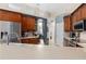Well-equipped kitchen featuring lots of counterspace and stainless steel appliances at 1125 E Tuskawilla Pt, Winter Springs, FL 32708