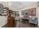 Open living area featuring a bar, comfortable seating, and stylish decor at 1125 E Tuskawilla Pt, Winter Springs, FL 32708