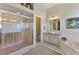 Bathroom featuring a vanity, shower, tub, and decorative wall art at 1137 Palm Cove Dr, Orlando, FL 32835