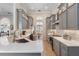 Well-equipped kitchen featuring stainless steel appliances, ample counter space, and modern gray cabinetry at 1137 Palm Cove Dr, Orlando, FL 32835