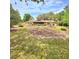 Beautiful backyard perfect for relaxing or entertaining and features a large lawn and mature trees for plenty of shade at 1212 Foxfire Dr, Apopka, FL 32712