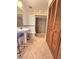 Bathroom with single sink, toilet, and brown tile shower with sliding glass door at 1212 Foxfire Dr, Apopka, FL 32712