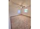 Bedroom featuring neutral walls, carpet, a ceiling fan, and natural light from a window at 1212 Foxfire Dr, Apopka, FL 32712