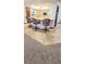 Stylish breakfast bar with seating for three, perfect for casual dining and entertaining in the kitchen area at 1212 Foxfire Dr, Apopka, FL 32712