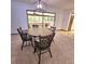 Traditional dining room with wooden table, and decorative lighting, perfect for Gathering meals and entertaining guests at 1212 Foxfire Dr, Apopka, FL 32712