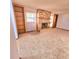 Charming living room with a cozy fireplace, built-in bookshelves, and natural light creating a warm atmosphere at 1212 Foxfire Dr, Apopka, FL 32712