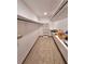 Spacious walk-in closet with built-in shelving, rods, and carpeted floor at 1212 Foxfire Dr, Apopka, FL 32712