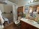 Bathroom with shower-tub combo, single sink vanity, and medicine cabinet at 1221 Perkins Rd, Orlando, FL 32809