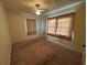 Cozy bedroom with carpet and windows at 1221 Perkins Rd, Orlando, FL 32809