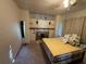 Bedroom featuring decorative fireplace and ceiling fan, but lacks furniture and organization at 1221 Perkins Rd, Orlando, FL 32809