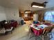 Open floor plan features dining room with tile floor and access to kitchen at 1221 Perkins Rd, Orlando, FL 32809