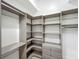 Spacious walk-in closet with custom shelving and ample storage at 1406 Cr 542G, Bushnell, FL 33513