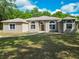 Charming single-story home with well-maintained lawn and a welcoming entrance at 1406 Cr 542G, Bushnell, FL 33513