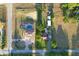 Large estate featuring lush landscaping, pool, ample parking, and a private ambiance at 15714 Turkey Farm Rd, Minneola, FL 34715