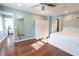 Spacious bedroom featuring natural light, and closet space for comfort and convenience at 15714 Turkey Farm Rd, Minneola, FL 34715