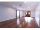 Spacious living room with recessed lighting, wood flooring and ample natural light offering a welcoming atmosphere at 15714 Turkey Farm Rd, Minneola, FL 34715