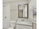 Bathroom featuring a tile shower, a new toilet, and a mirror at 1805 Knox Ave, Sanford, FL 32771