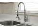 Kitchen sink featuring a modern faucet, and a window at 1805 Knox Ave, Sanford, FL 32771