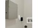 Utility connections and access panel in this unfurnished laundry room at 1805 Knox Ave, Sanford, FL 32771