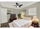 Nicely decorated main bedroom with modern furniture and wall art at 1805 Knox Ave, Sanford, FL 32771
