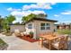 Back patio with furniture to enjoy your time outdoors at 1805 Knox Ave, Sanford, FL 32771