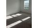 Spacious bedroom with carpet and a large window, offering plenty of natural light at 2081 Viewfinder St, Kissimmee, FL 34758
