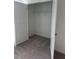 Walk-in closet has carpet and a shelf with supports at 2081 Viewfinder St, Kissimmee, FL 34758