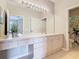 Bright bathroom with a large mirror and ample counter space at 2300 Silver Palm Dr # 205, Kissimmee, FL 34747