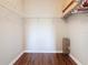 A walk-in closet with wire shelving and wood floors at 2300 Silver Palm Dr # 205, Kissimmee, FL 34747
