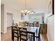 Open-concept dining room showcases a view into the living room at 2300 Silver Palm Dr # 205, Kissimmee, FL 34747
