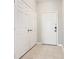 Hallway featuring closet and entry door at 2300 Silver Palm Dr # 205, Kissimmee, FL 34747