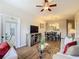 Bright and open living area with views of dining room, patio, and natural light, perfect for relaxation and entertainment at 2300 Silver Palm Dr # 205, Kissimmee, FL 34747