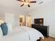 Spacious bedroom showing wood flooring and ensuite bathroom at 2300 Silver Palm Dr # 205, Kissimmee, FL 34747