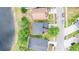 An aerial view shows the house's proximity to the lake and neighborhood at 2308 Holly Pine Cir, Orlando, FL 32820