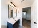 Modern bathroom featuring a sleek mirror, updated lighting, and a stylish vanity at 2308 Holly Pine Cir, Orlando, FL 32820