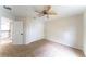 Bedroom featuring carpeting, a ceiling fan, and ample storage space, ideal for comfort at 2308 Holly Pine Cir, Orlando, FL 32820