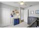 Bright bedroom with ample storage space and natural light at 2423 Auld Scot Blvd, Ocoee, FL 34761