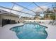 Sparkling screened-in pool with ample deck space, perfect for relaxation and outdoor entertainment at 2423 Auld Scot Blvd, Ocoee, FL 34761