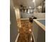 Upstairs landing showcasing tile floors, neutral decor and modern lighting at 2737 Merrieweather Ln, Kissimmee, FL 34743