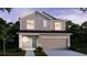 Charming two-story home featuring a two-car garage, landscaped yard, and a blend of modern design at 2799 San Marco Way, Winter Haven, FL 33884