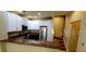 Modern kitchen features stainless steel appliances, breakfast bar, and white cabinetry for a sleek design at 2834 Bella Vista Dr, Haines City, FL 33844