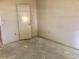 Empty bedroom with white walls and an access door to another room at 307 Santa Clara Cir, Lady Lake, FL 32159