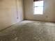Bedroom featuring a window allowing natural light and potential for personalization at 307 Santa Clara Cir, Lady Lake, FL 32159