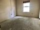 Empty bedroom, illuminated by natural light, offering a clean canvas for customization at 307 Santa Clara Cir, Lady Lake, FL 32159