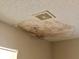 Damaged ceiling with evidence of a prior leak needing repair or replacement at 307 Santa Clara Cir, Lady Lake, FL 32159