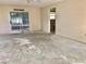 View of a living room with sliding glass doors leading to the exterior patio area at 307 Santa Clara Cir, Lady Lake, FL 32159